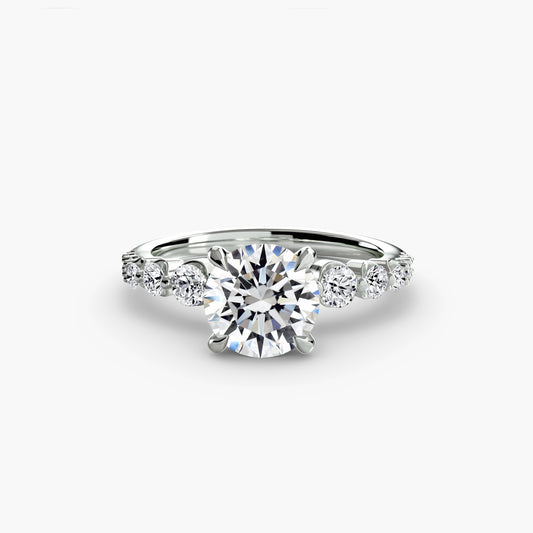 Anello solitario con diamanti laterali 2