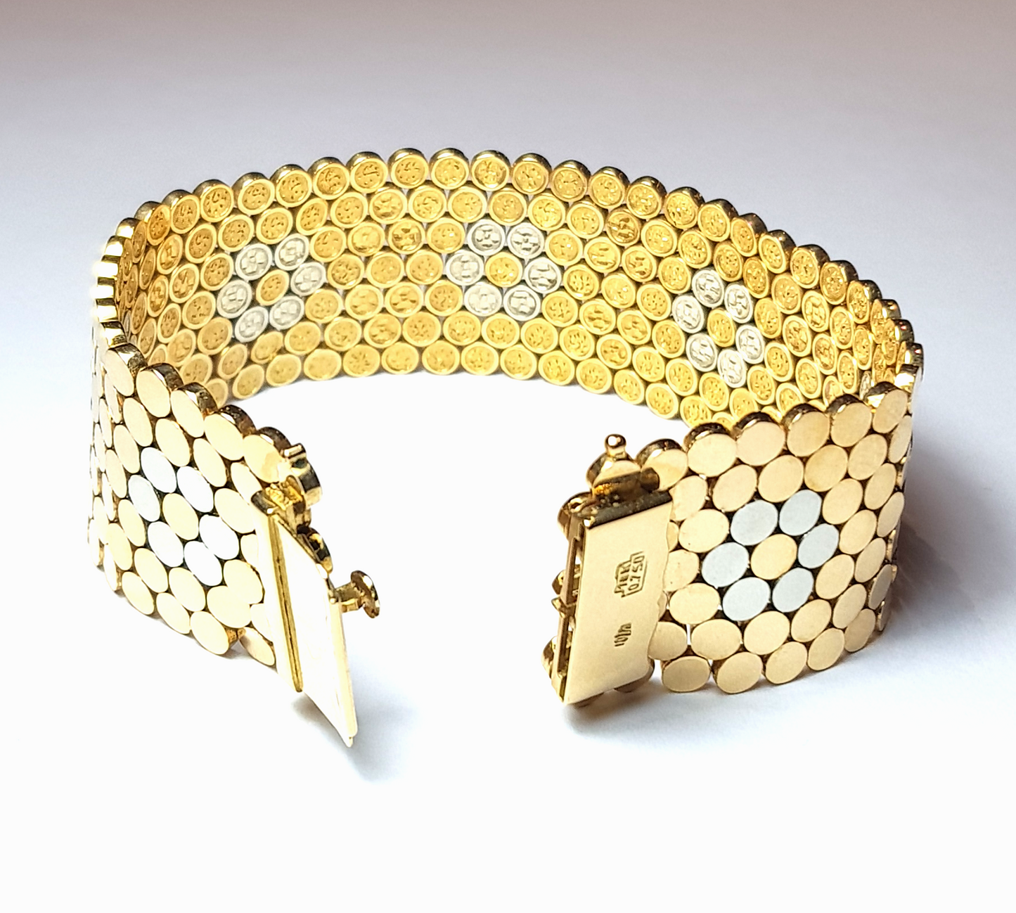 Bracciale vintage anni '50 in oro giallo e bianco 18k
