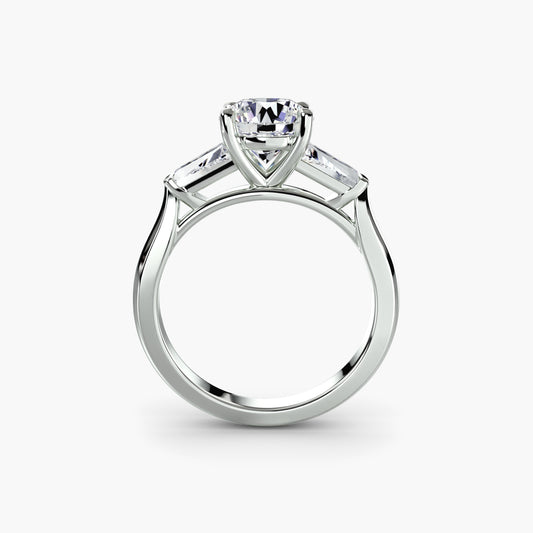 Anello trilogy con baguette laterali