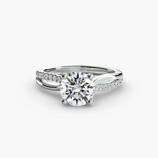 Anello solitario gambo diviso con pavè