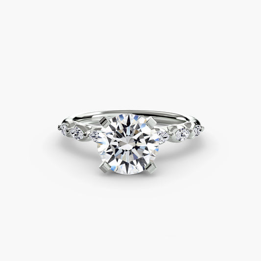 Anello solitario accenti floreali