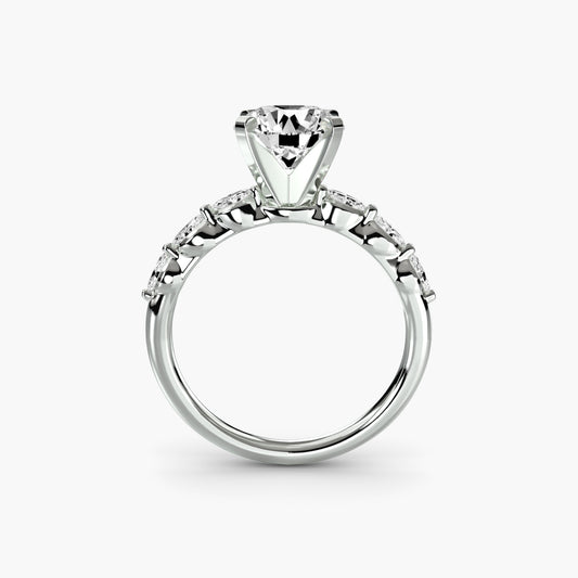 Anello solitario accenti floreali
