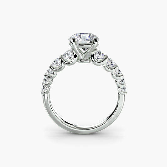 Anello solitario diamanti ad arco