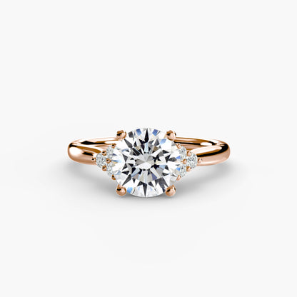 Anello solitario 6 diamanti a lato