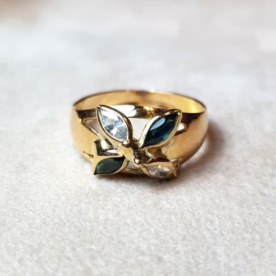 Anello oro giallo 18k fiore zirconi verdi e bianchi